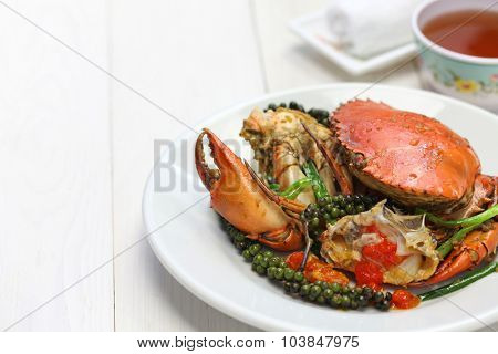 stir-fried crab with green kampot pepper, cambodian cuisine