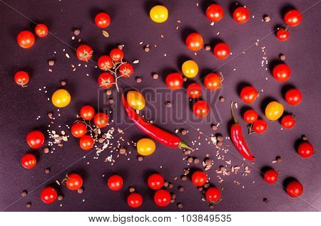 Fresh vegetables on a black table. Autumn background.