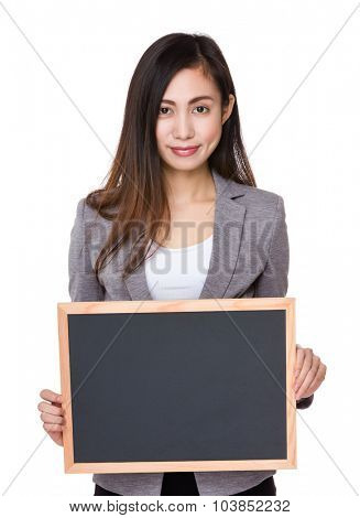 Asian Young businesswoman show with the blackboard