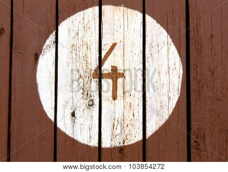Number Four On Painted Wooden Wall.