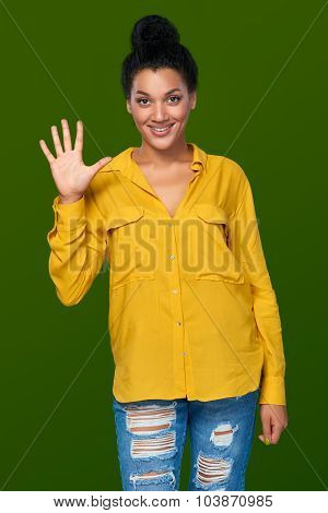 Woman showing five fingers