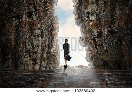 Business person in the cave