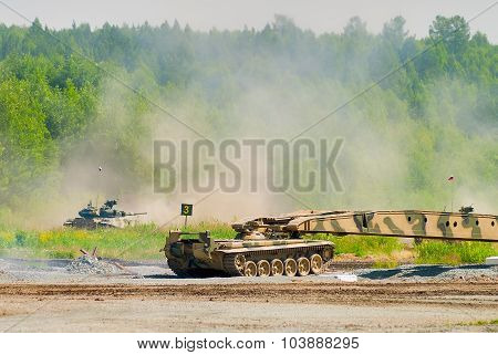 Bridge layer MTU-72 in action under tank cover