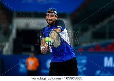 KUALA LUMPUR, MALAYSIA - SEPTEMBER 26, 2015: Luca Vanni of Italy plays his qualifying match in the Malaysian Open 2015 Tennis tournament held at the Putra Stadium, Malaysia.