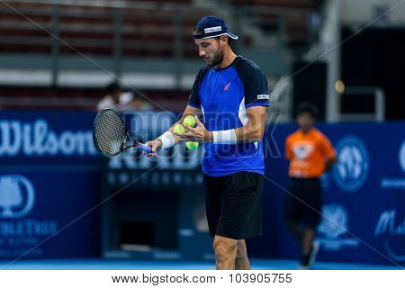 KUALA LUMPUR, MALAYSIA - SEPTEMBER 26, 2015: Luca Vanni of Italy plays his qualifying match in the Malaysian Open 2015 Tennis tournament held at the Putra Stadium, Malaysia.