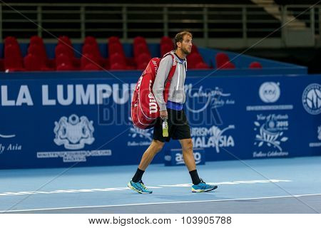 KUALA LUMPUR, MALAYSIA - SEPTEMBER 26, 2015: Luca Vanni of Italy enters the court his qualifying match in the Malaysian Open 2015 Tennis tournament held at the Putra Stadium, Malaysia.
