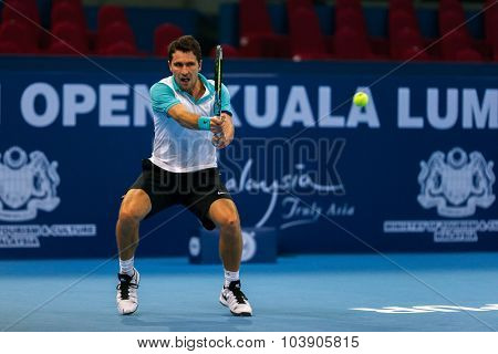 KUALA LUMPUR, MALAYSIA - SEPTEMBER 26, 2015: Mischa Zverev of Germany plays his qualifying match in the Malaysian Open 2015 Tennis tournament held at the Putra Stadium, Malaysia.