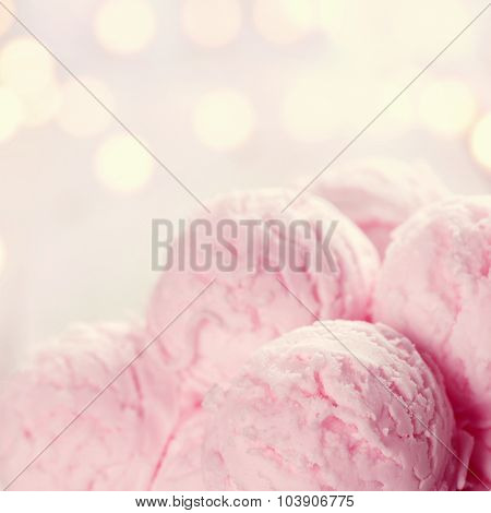 Close up pink ice cream with blurry shiny bokeh background. Retro vintage toned.
