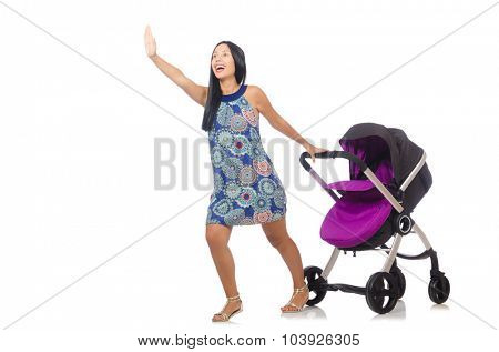 Happy mom with her baby in pram 