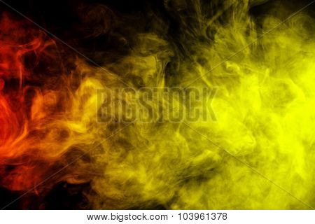 Abstract Red And Yellow Smoke Hookah On A Black Background.