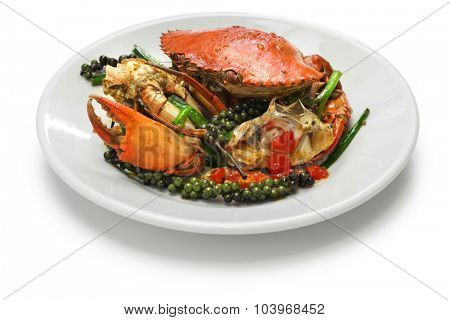 stir-fried crab with green kampot pepper, cambodian cuisine isolated on white background