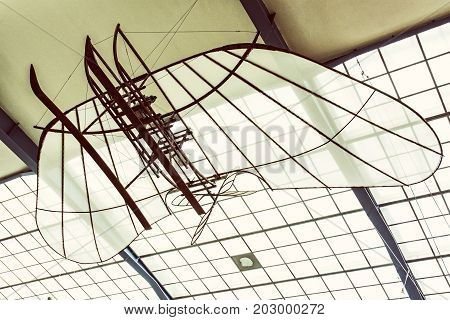 Historic airplane national technical museum in Prague Czech Republic. The transportation history exhibit. Old photo filter.