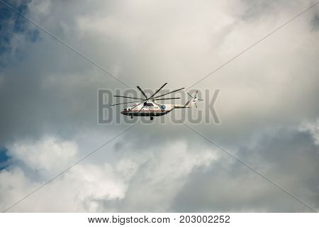 Khabarovsk, Russia - September 3, 2017: Mi-26 heavy military transport helicopter in flight in flight in the colors of the Ministry of emergency situations of Russia