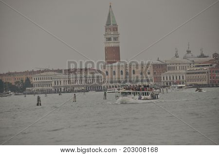 Narrow canals and alleyways in Venice. City of monuments in gondola.