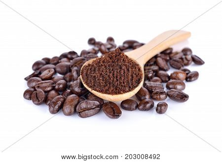 ground coffee and roasted coffee beans arabica strong blend on white background