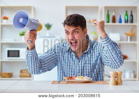 Husband with loudspeaker yelling at his wife