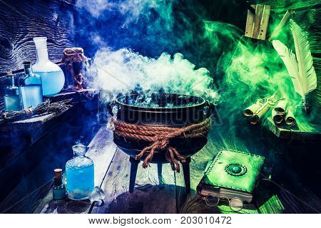 Old Witcher Cauldron With Books And Scrolls For Halloween