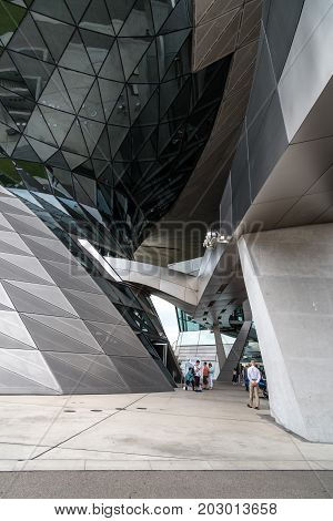 Munich, Germany - August 3, 2017: Exterior shot of BMW Welt in Munich. It is a multi-use exhibition center used for meetings and promotional events. Designed by archtectural firm Coop Himmelblau