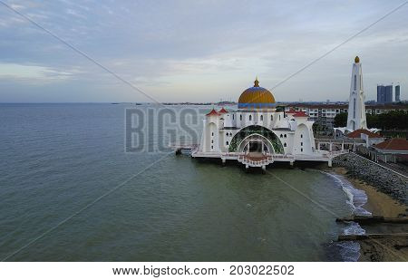 Majestic view of Malacca Straits Mosque during sunset.