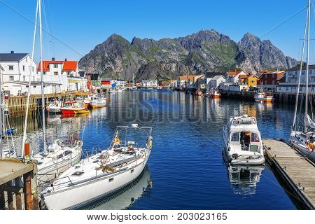 Scenic View Of The Waterfront Harbor In Henningsvaer In Summer