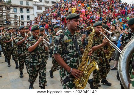 KATHMANDU NEPAL - 9/26/2015: Nepali military musicians perform during the Indra Jatra festival at Durbar Square in Kathmandu Nepal.