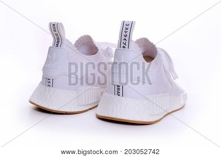 Kuala Lumpur, Malaysia - July 23, 2017: Rear view picture of a pair Adidas Original NMD R1 Gum Pack All White