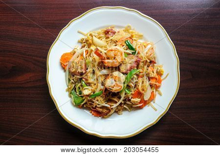 Shanghai Noodle, Stir-fried vermicelli rice noodles with egg, carrots, napa, onion, celery and bean sprout