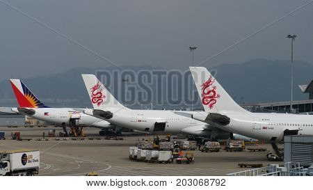 HONG KONG--Dragon Air and Philippine Airlines planes at the Hong Kong International Airport in December 2016.