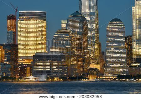 Manhattan Skyline over Hudson river at dusk New York City