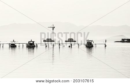Construction of a new bridge from Trogir to the Ciovo island Croatia southern Europe. Black and white photo.