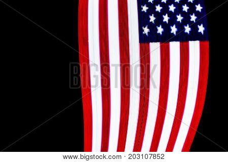 USA Flag lightpainted on black background texture