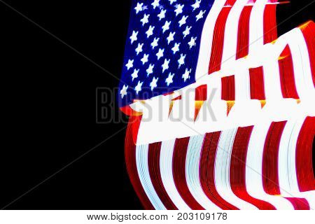 USA Flag lightpainted on black background texture