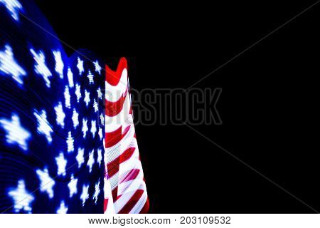 USA Flag lightpainted on black background texture