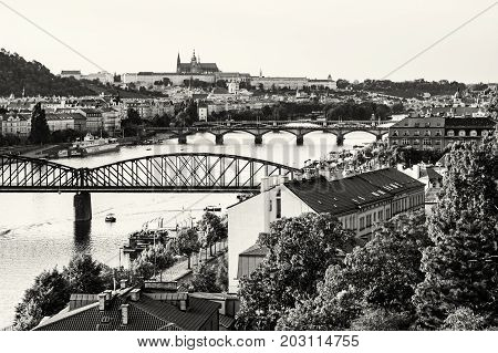 View from the Vysehrad to the castle and river Vltava with bridges Prague Czech republic. Travel destination. Black and white photo. Cultural heritage. Beautiful place.