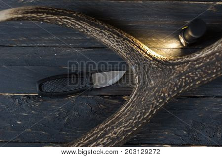 Hunting Knife With A Lighted Flashlight.