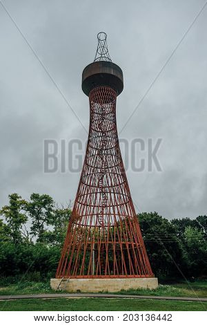 Rusty abandoned water tower. First hyperboloid of engineer Shukhov in Polibino, Lipetsk region