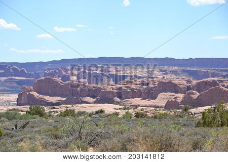 utahs arches national park has stunning landscapes filled with rock formations, arches and dunes