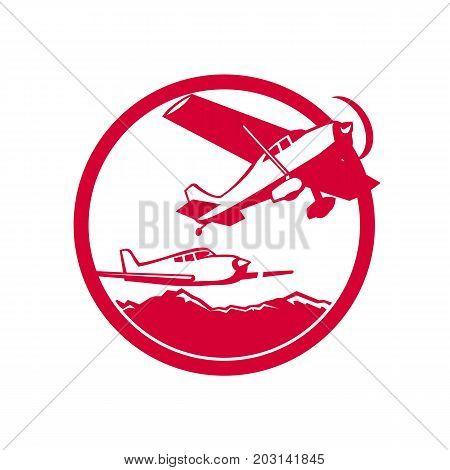 Retro style illustration of two Fixed Wing Aircraft Taking Off with mountains in background set inside Circle on isolated background.