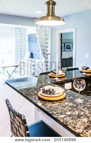 Grapes On Plate Of Modern Granite Kitchen Bar In Luxury Apartment, Home Or House Model
