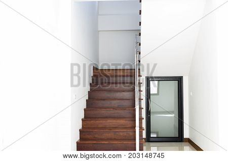 interior design staircase concrete top wooden stainless steel railing in the home