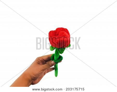 Man Hand Holding The Phony Red Rose With Green Stalk