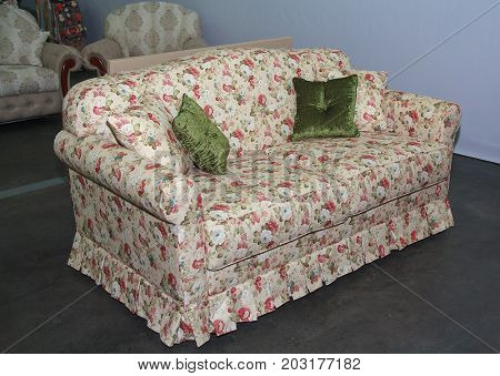 Sofa of the classic style in the trading room. Furniture