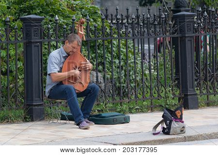 Kiev Ukraine - July 16 2017: Street musician Ukraine tradition instrument