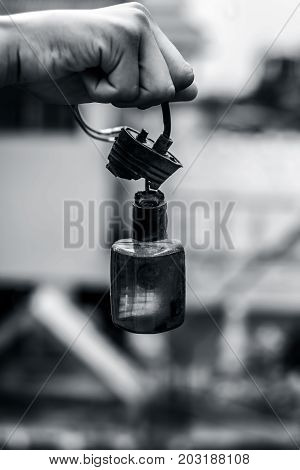 A Hand Holding A Indiacator Of Motorbike.