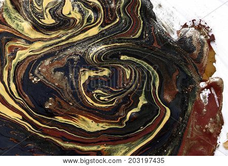 Marbled abstract background. Liquid marble pattern. Colorful marble backdrop. Golden glitter texture
