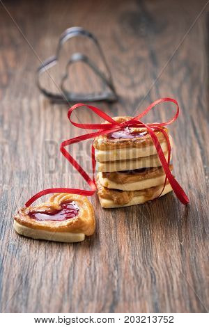 Jelly cookie on a rustic table with cookie cutter. Use it for a recipe.