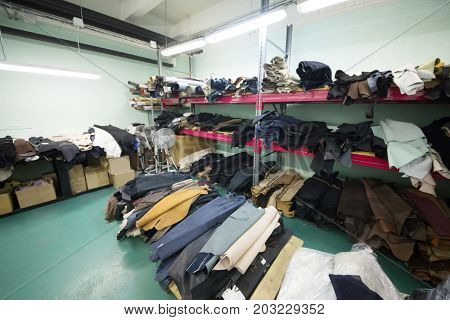 MOSCOW - FEB 21, 2017: Workshop with shelves with leather rolls at Ralf Ringer shoes factory. Ralf Ringer has 41 brand store in Moscow