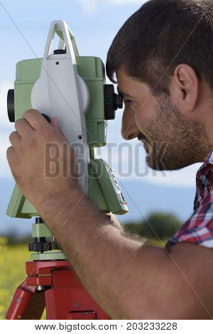 Total station Close-up Surveyor Rapeseed Looking Geodesy