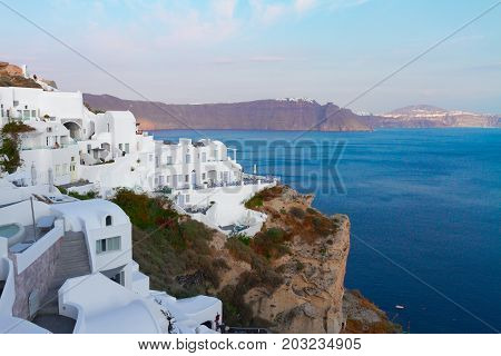 view of volcano caldera with white houses and deep blue water of Aegan sea, Santorini island, Greece