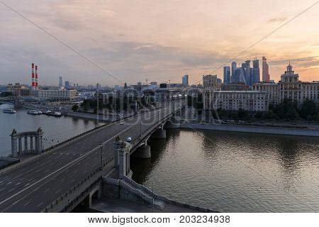 MOSCOW - JUN 10, 2016: Borodinsky Bridge, river, quay and panorama of city
